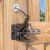 Self-locking gate latch