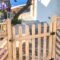Self-locking gate latch